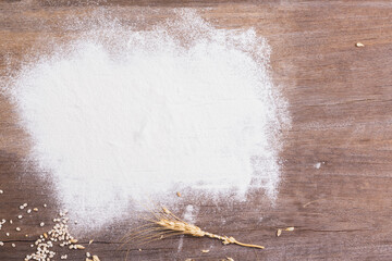 white podder bomb The distribution of flour on table wood  background - top view