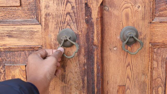 Young Man Hand Knocking Door,