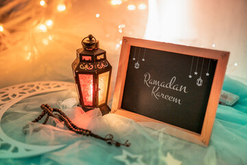 Ramadan Kareem Greeting image, colourful lantern with black board and Ramadan decoration 2023 Ramadan Mubarak and Eid al adha  concept image