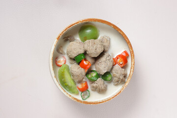 Cok Ganem or Gecok Ganem or Kecok Ganem is an Indonesian Traditional Royal Dish from Yogyakarta, made from Meatball in Coconut Milk Syrup, dominated by sour and spicy flavors. 

