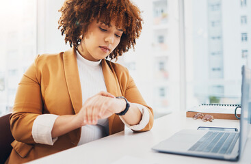 Black woman, time management and check watch with schedule and clock, laptop and desk with...