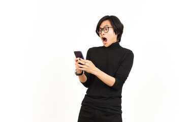 Fototapeta premium Holding and Using Smartphone With Shocked Face Of Handsome Asian Man Isolated On White Background