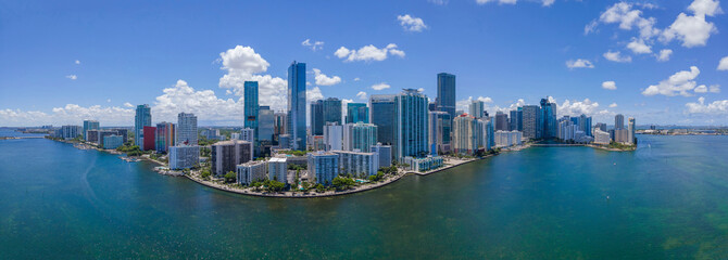 High rise buildings surrounded by Miami South Channel in Miami Beach Florida. Panoramic view of the...