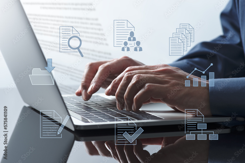 Poster document management technology. business person using laptop for preparing documents.
