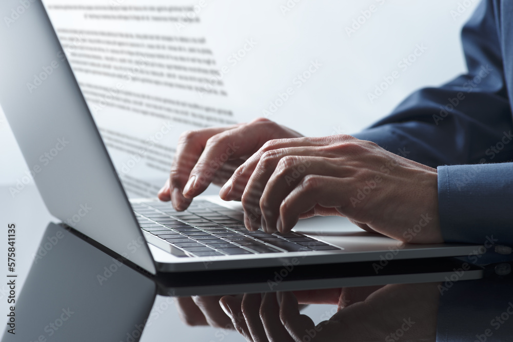 Poster writing business document. business person using laptop. close up of hands typing.