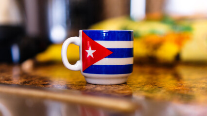 Cuban cofee cup with cuban flag in the kitchen #bokeh background