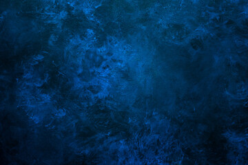 Deep blue texture or background with stains, waves and grain elements. Image with place for text. Template for design