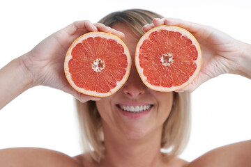 Picture of nice blonde woman with grapefruit