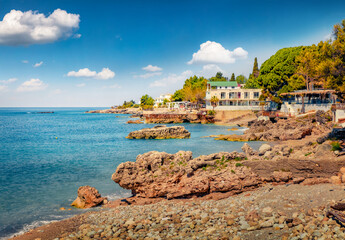 Fototapeta premium Rocky spring view of publik beach in Dhermi town. Attractive morning seascape of Adriatic sea. Stunning outdoor scene of Albania, Europe. Vacation concept background.