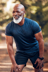 Black man, running break and breathing for fitness, exercise and workout in nature, park or garden. Senior male, sports rest and smile for motivation, health and outdoor wellness training with music