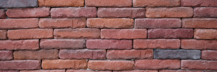 Obraz premium Texture of old red brick wall. Background of empty brick wall basement