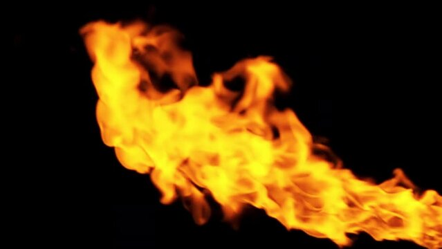Fire, explosion, fire blast, fiery stream isolated on a black background. 4k slow motion raw video high quality. Filmed on high speed cinema camera, 1000fps. ProRes 422 HQ. Rec 2100 HLG.