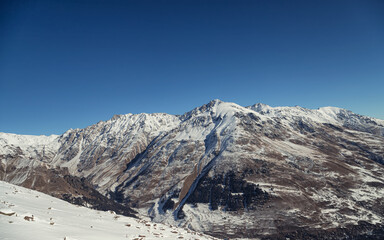 View of the mountain snow-capped mountain peaks