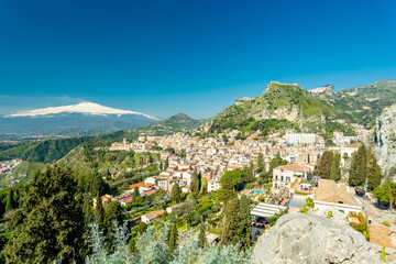 Taormina, Sicily. View of town, theater and Etna	