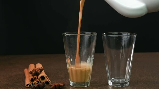 Serving Indian tea in glass cups.