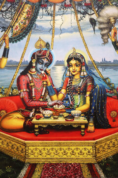 Painting depicting Hindu god Krishna sitting with his consort Radha. India.