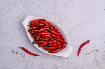 Pickled red hot peppers