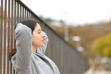 Woman resting and relaxing in the street