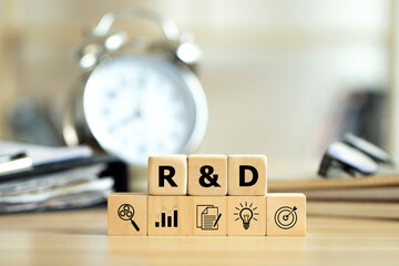 R and D letters and R&D icons on wooden cubes, Research and Development Business Science Technology...