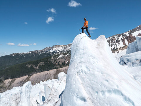 A climber on a serac on Mount Baker in Washington.