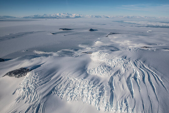 Aerial image of crevasses on the flanks of Mount Erebus, Antarctica. - Powered by Adobe