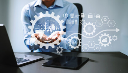 Fototapeta premium Businesswoman working virtual tablet computer twith reduce CO2 concept with icons, global warming such as reforest green factory recycle in office..