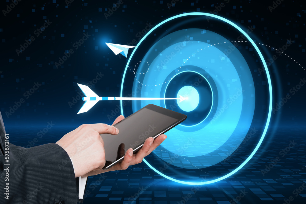 Poster target concept with a glowing hologram of bullseye and arrow hitting the center. growth strategy. go