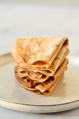 Traditional sweet thin crepes, close-up.