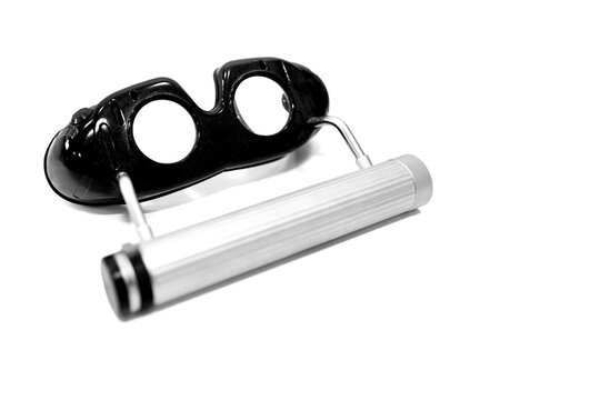 Therapeutic glasses after a stroke isolated on white Background. Frenzel glasses. Frenzel nystagmus glasses