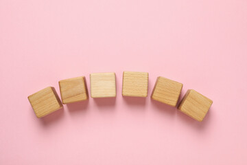 Blank wooden cubes for different concepts, top view
