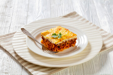 Greek Pastitsio on white plate, top view