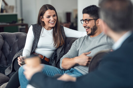 Cheerful colleagues together having discussion at office