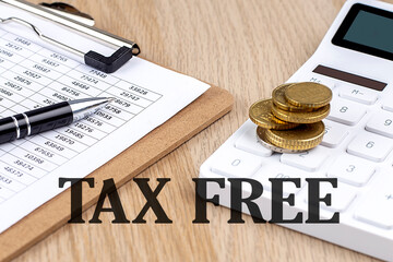 TAX FREE text with chart and calculator and coins , business concept