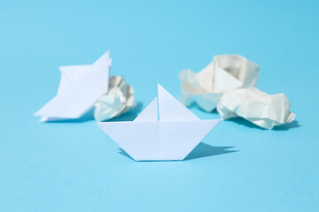 Concept of business competition with paper boats