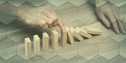 Concept of business control by stopping domino effect, geometric pattern