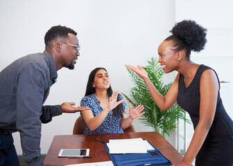 Couple having an argument, fight, disagreement with mediator. Divorce lawyer