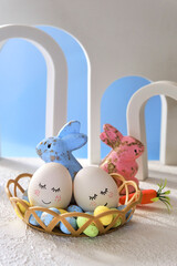 Easter eggs. Happy easter card. Easter eggs and candy rabbits. Easter greetings.