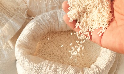 Rice Grains Falling From Hand