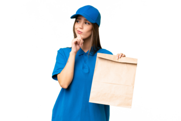 Young beautiful caucasian woman taking a bag of takeaway food over isolated background and looking up