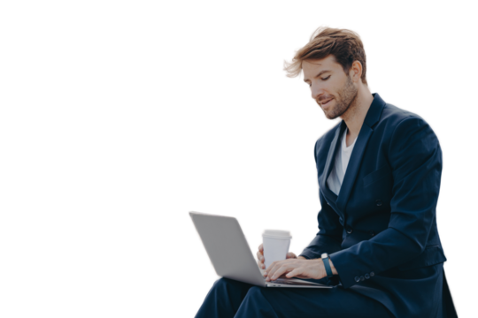 Businessman in formal suit reads news via laptop computer works online drinks takeaway coffee