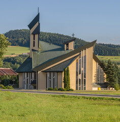 Parish dedicated to the holy Apostles Peter and Paul Church. Lososina Dolna village in Nowy Sacz County, Lesser Poland  - obrazy, fototapety, plakaty