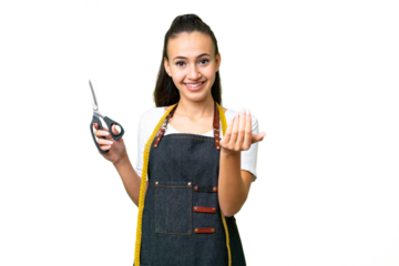 Young Seamstress woman over isolated chroma key background inviting to come with hand. Happy that you came
