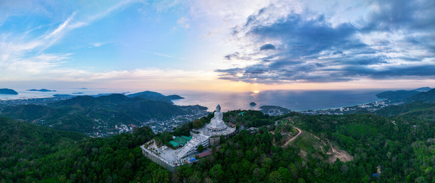 Aerial view Panorama Big buddha statue on top of the mountain in phuket, Aerial view Drone beautiful sunset nature landscape, Phuket island Thailand,Amazing view travel background