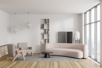 Front view on bright living room interior with sofa, armchairs