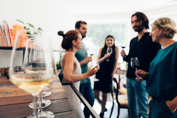 group of friends spend good time together at the winery enjoying a glass during a wine tasting