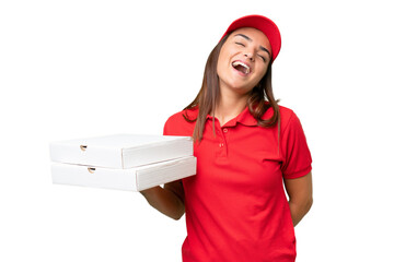 Pizza delivery caucasian woman with work uniform picking up pizza boxes isolated on green chroma...