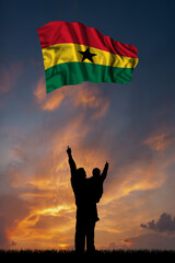 Father with son and the flag of Ghana