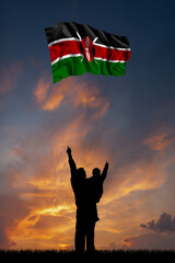 Father with son and the flag of Kenya