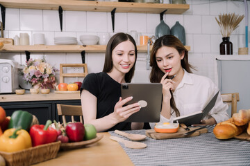 Woman jotting down bread recipe through tablet.