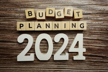Budget Planning 2024 alphabet letters on wooden background